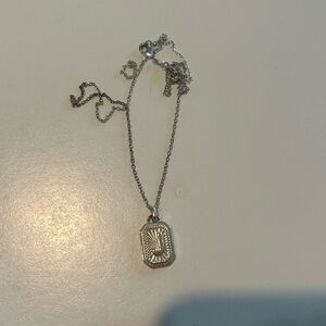 silver letter “J” necklace